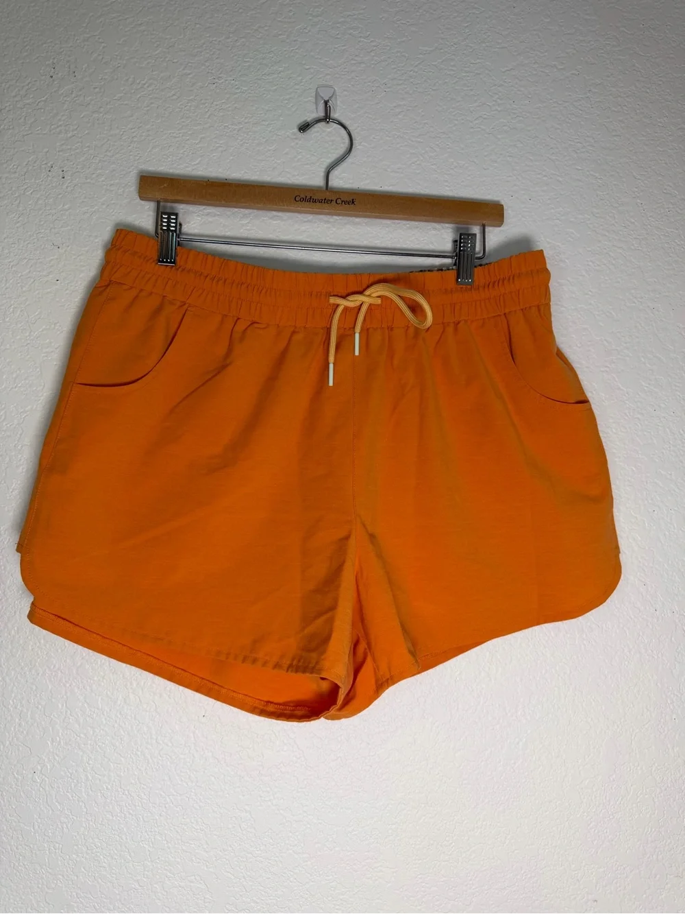 United By Blue Women's Responsible Swim Shorts in the color Orange Ochre, XL - Picture 2 of 9